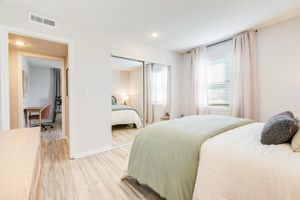 Walk-in closet and entrance to platinum bedroom at The Arbor in Blue Springs, Missouri