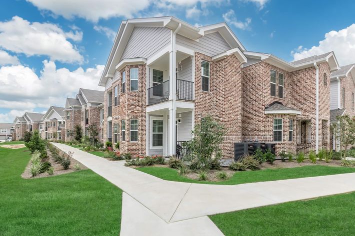 a large lawn in front of a house