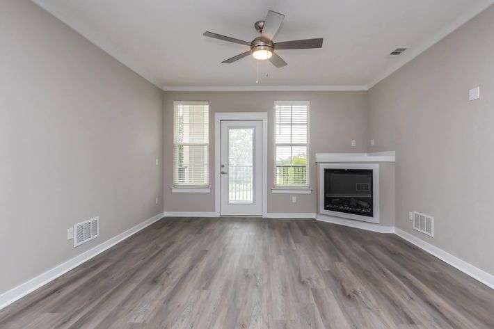 a kitchen with a wood floor