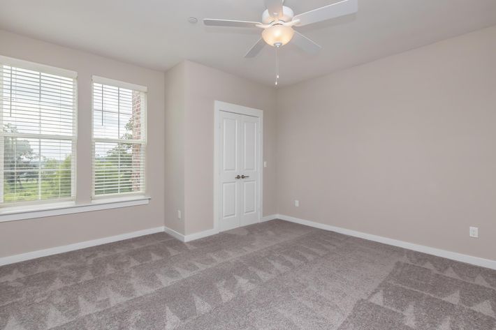 a living room next to a window