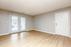 a room with a hard wood floor