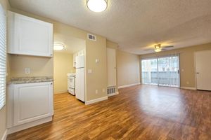 a kitchen with a wood floor