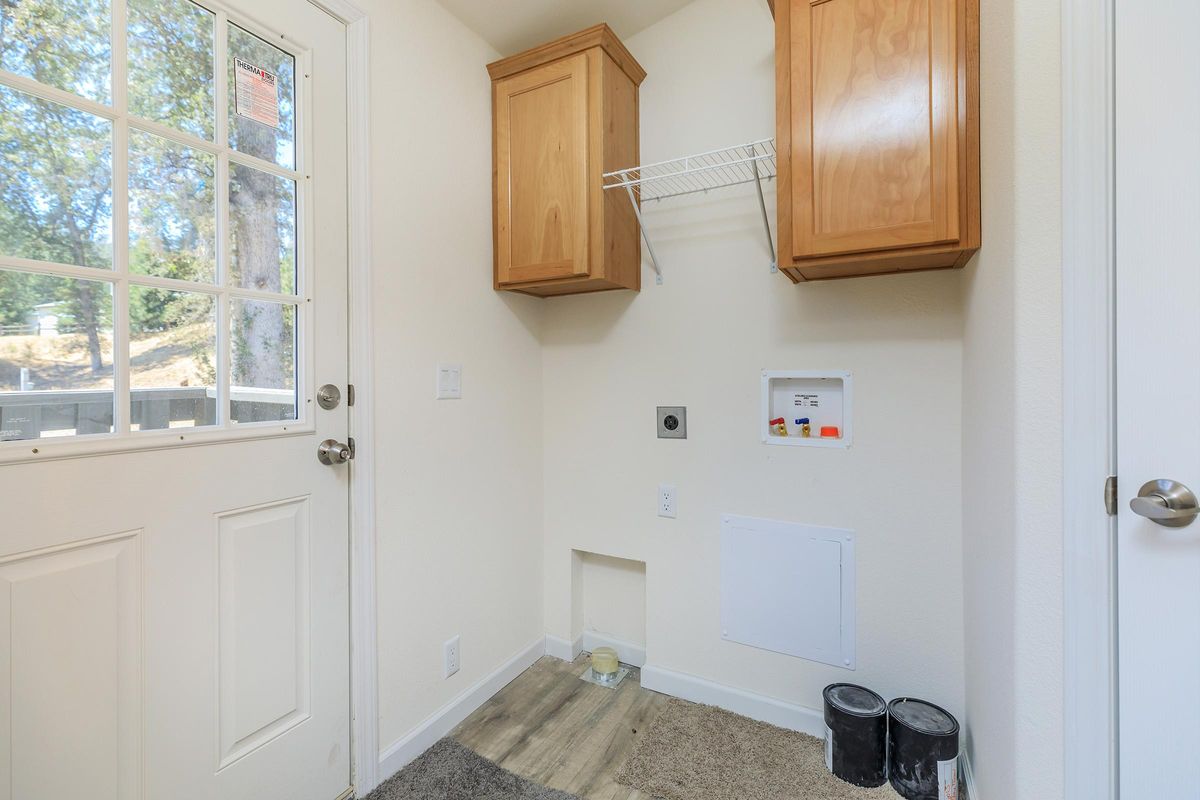 a kitchen with a sink and a window