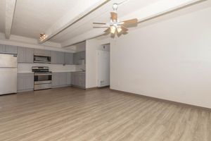 a kitchen with a wooden floor