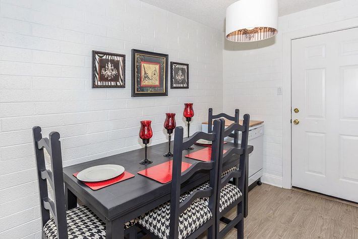 a large red chair in a room