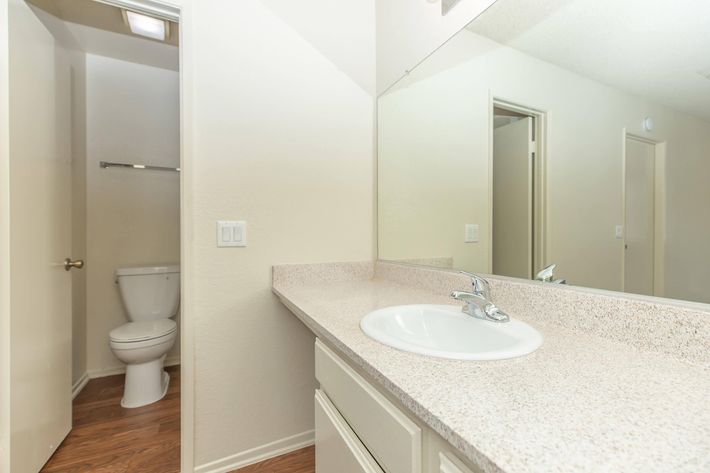 Bathroom with white cabinets