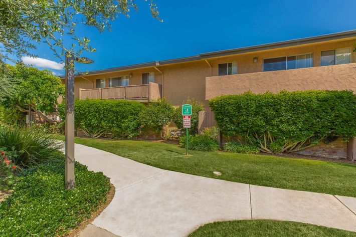 Vio Tustin community building with green grass