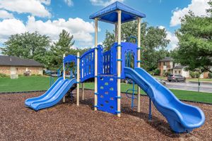 Blue playground equipment at Port Crossing Apartments in Portage, Indiana