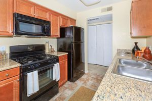 a kitchen with stainless steel appliances