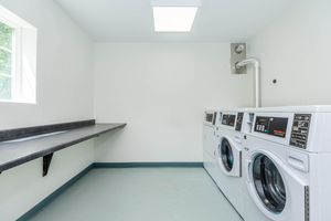 a kitchen with a sink and a window