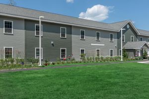 a large lawn in front of a house