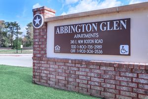 a sign on a brick building