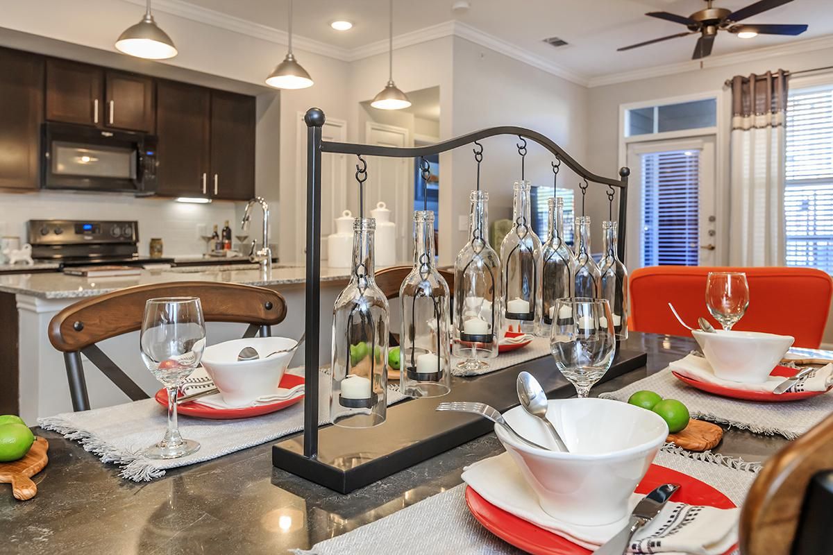 a kitchen with a blender on a table