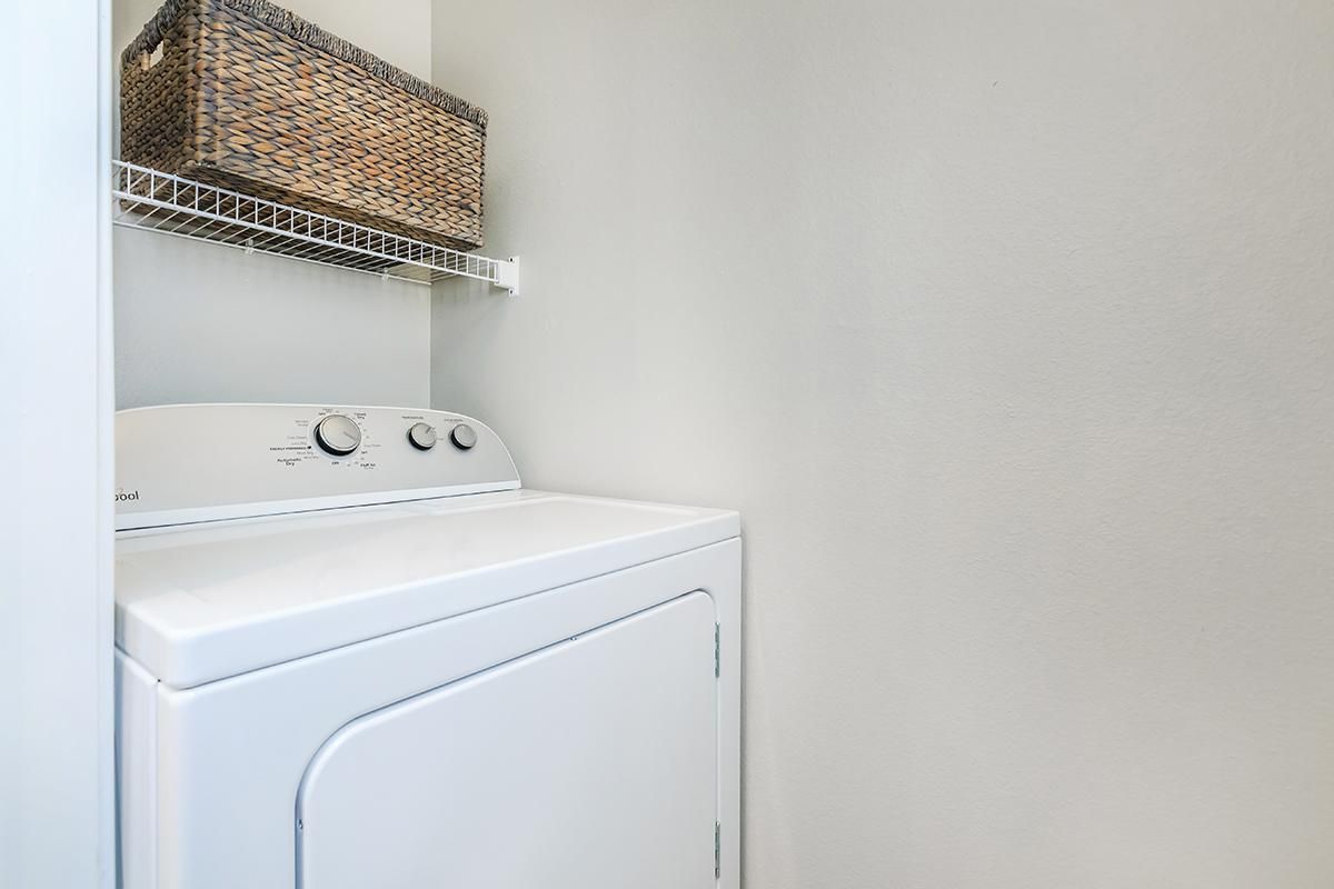 a white refrigerator freezer sitting in a room