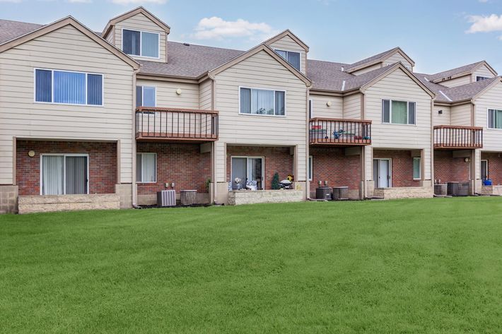 a house with a grass field