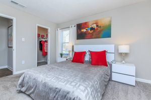 a bedroom with a bed in a hotel room