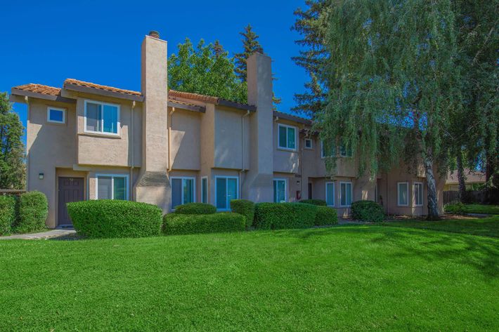 a large lawn in front of a house