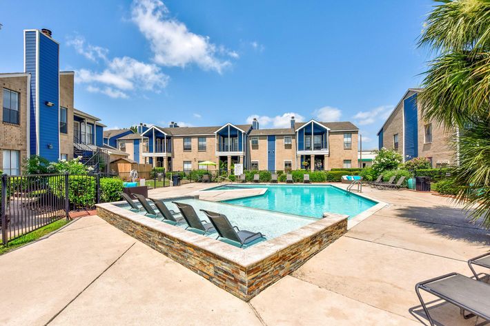 a pool next to a building