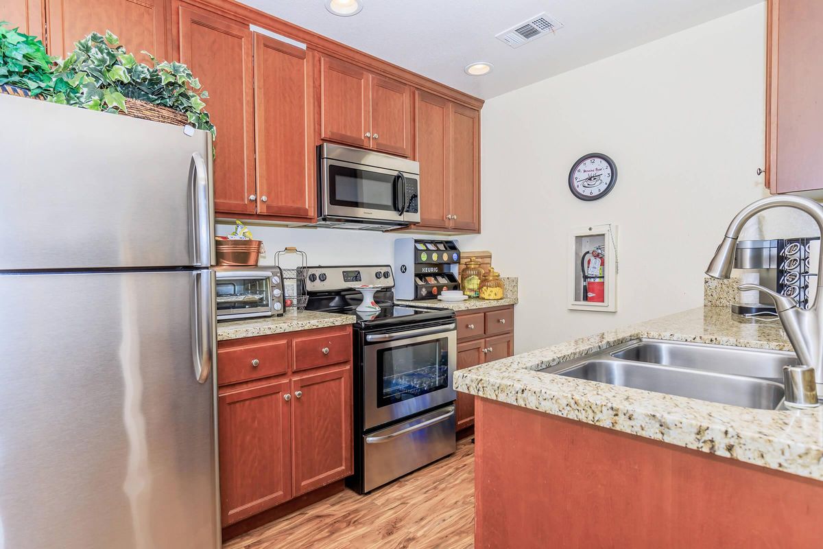 a stainless steel refrigerator in a kitchen