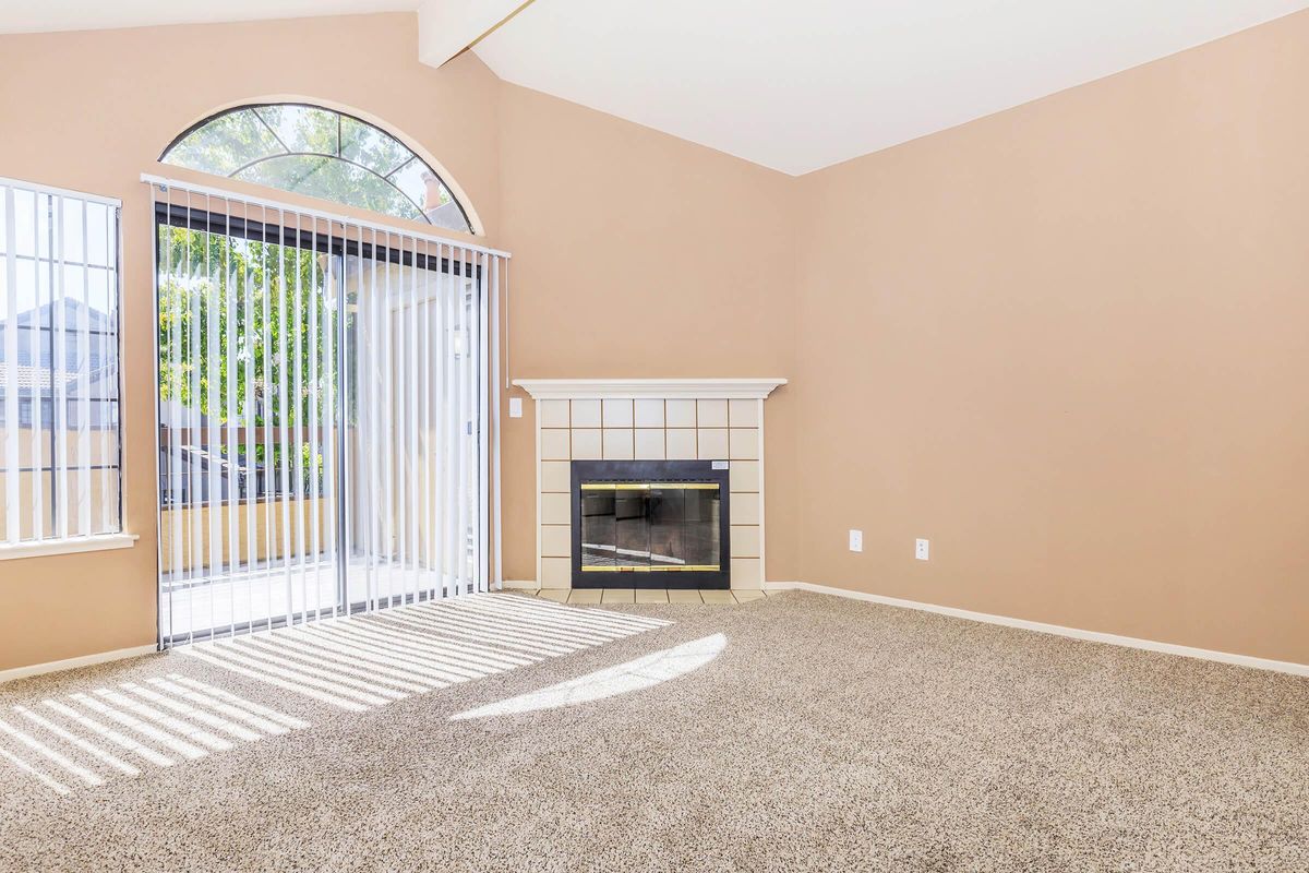 a bedroom with a large window