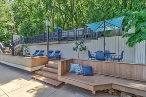 Poolside lounge with resort-style furniture at Dylan Apartments in Kansas City, Kansa