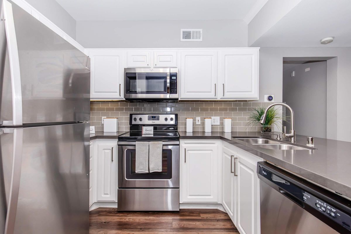 a kitchen with stainless steel appliances