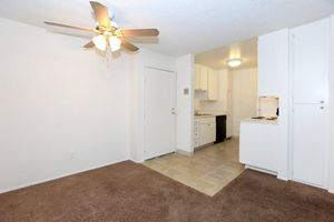 a large white refrigerator in a kitchen