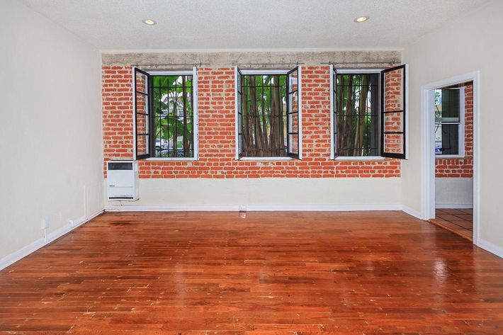 a large brick building with a wooden floor