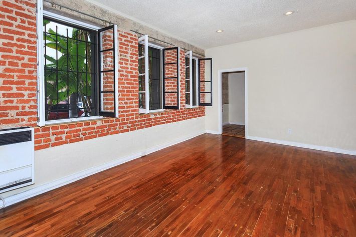 a large brick building with a wooden floor