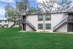 a large lawn in front of a house