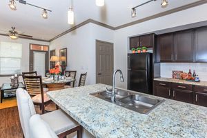 a modern kitchen with stainless steel appliances