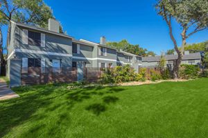 a large lawn in front of a house