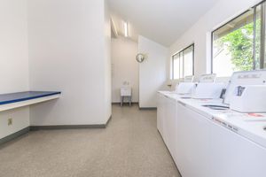 a kitchen with a sink and a window