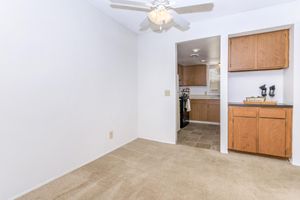 a kitchen with a sink and a mirror