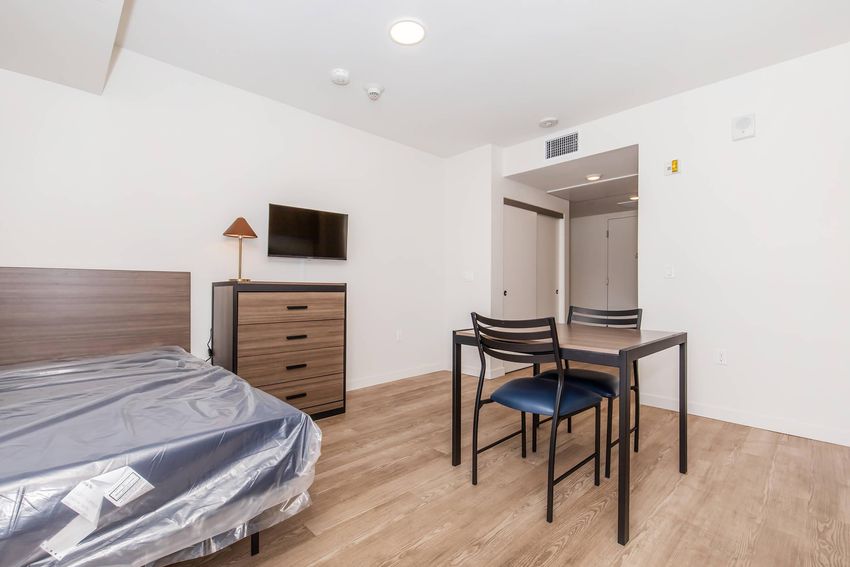 Furnished studio sleeping area.