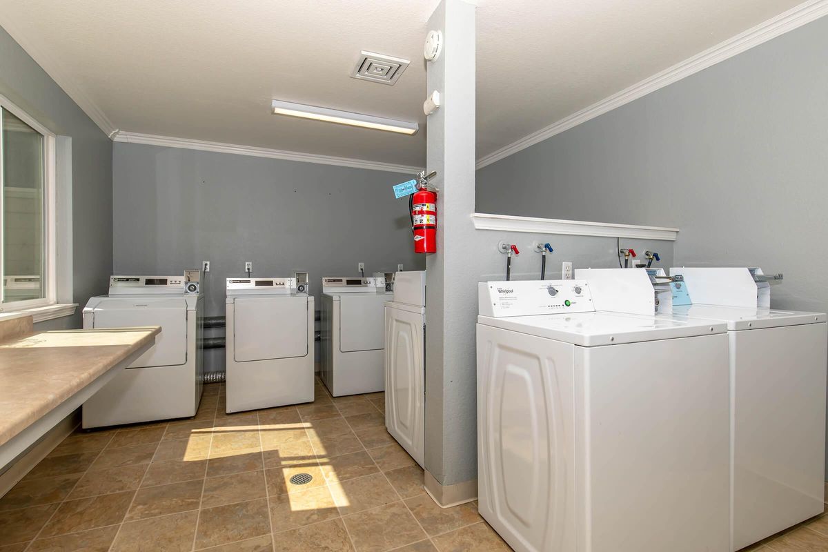 a kitchen with a tile floor