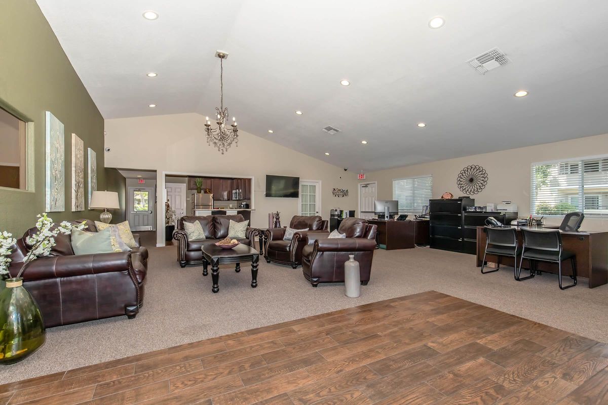 a living room filled with lots of furniture