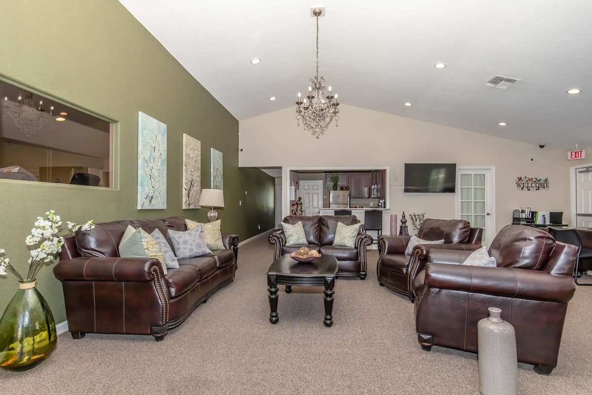 a living room filled with lots of furniture