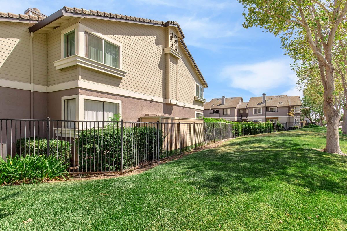 a large lawn in front of a house