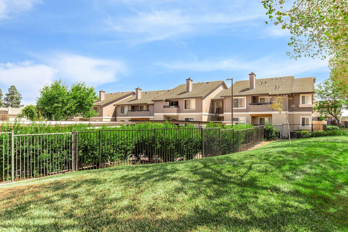 a large lawn in front of a house