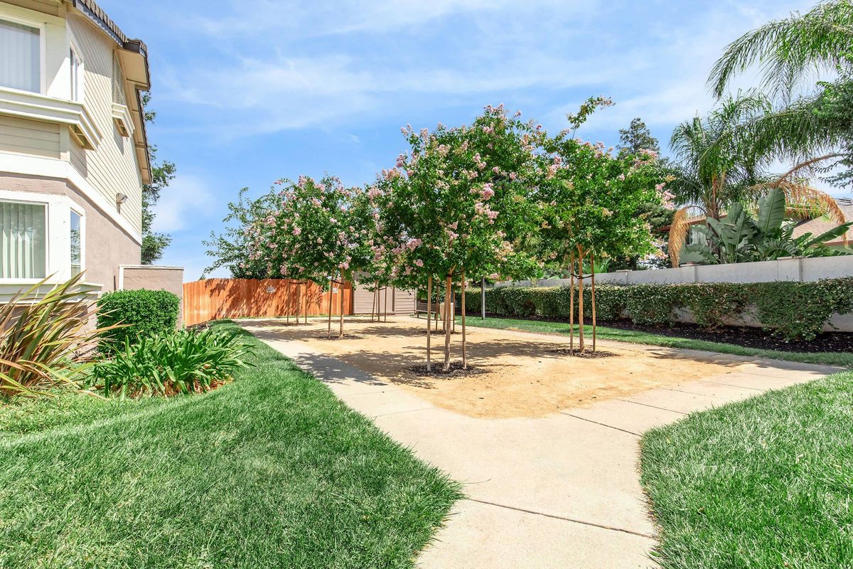 a garden in front of a building