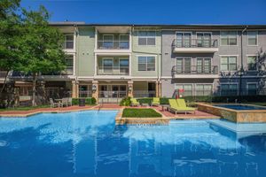 a large pool of water in front of a building