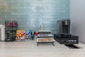 a stove top oven sitting inside of a building