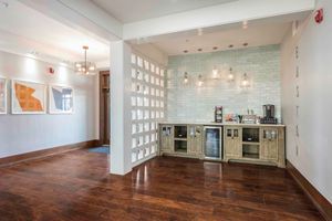 a room filled with furniture and a fireplace