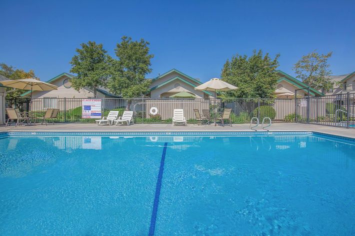 a house with a pool of water