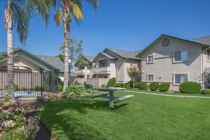 a large lawn in front of a house