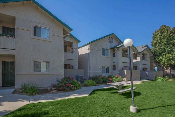 a large lawn in front of a house