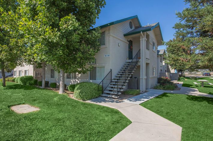 a large lawn in front of a house