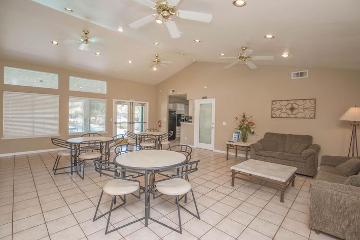 a room filled with furniture and a table