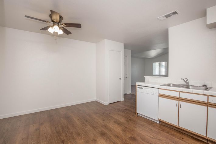 a large white refrigerator in a room